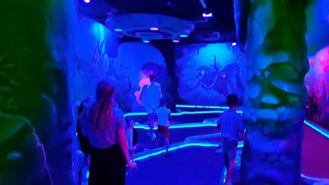 blacklight mini golf installation  